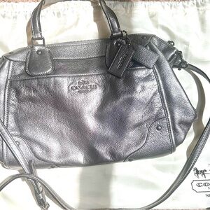 Silver authentic coach purse.